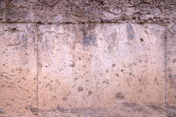 Close-up concrete exterior cracked dirty seamless patterned texture