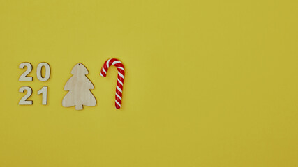 New Year decorations on a yellow background. Copy space, mock up.