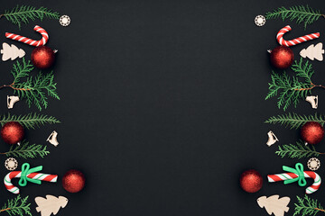 New Year's, festive decor on a black background. Copy space, flat lay, mock up, top view.