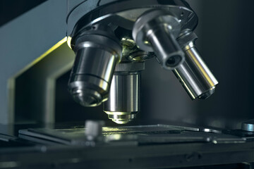 Microscope with metal lens for laboratory research