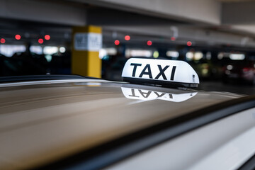Fototapeta na wymiar Taxi cab at the underground parking
