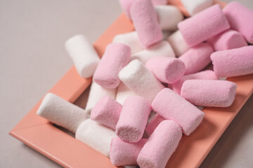 Fototapeta na wymiar Picture of sweet pink marshmallows on an isolated background