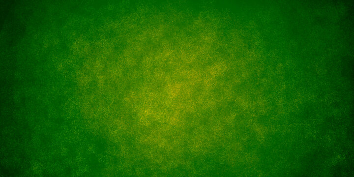 green dark textured abstract homogeneous holiday background for banners with shaded edges.