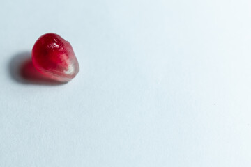 Close-up. Pomegranate seed. On a white background.