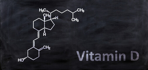Vitamin D3 molecular structure, chalk drawing on a blackboard