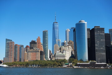 Fototapeta premium A view of One World Trade Center and lower Manhattan are seen on board the Staten Island Ferry.