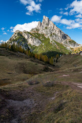 Beautiful alpine countryside. Scenic image of famous Sassolungo peak with overcast perfect blue sky. Wonderful Vall Gardena under sunlight. Majestic Dolomites Mountains. Amazing nature Landscape