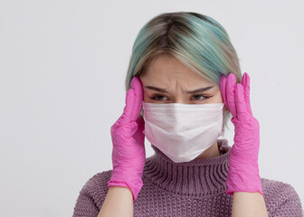 young adult woman in face protective mask amotional