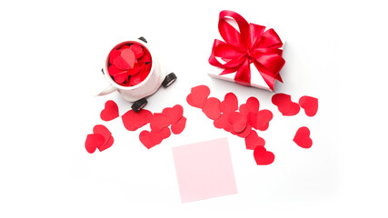 valentines day. gift box with red bow and blank sheet with cut paper hearts for love message on a white background.