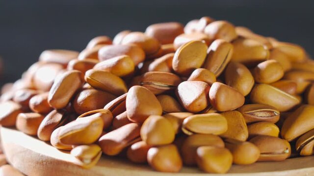 Pine nuts on a white board
