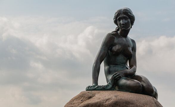 Copenhagen, Denmark - May 21, 2016: A picture of the Den Lille Havfrue statue (The Little Mermaid).