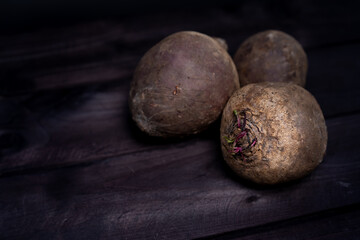 Beet is on a wooden background