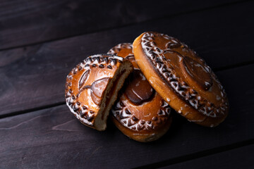 Gingerbread cookies on wooden background