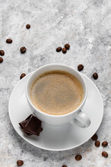 Coffee cup and coffee beans.