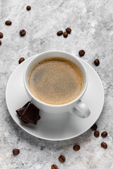 Coffee cup and coffee beans.