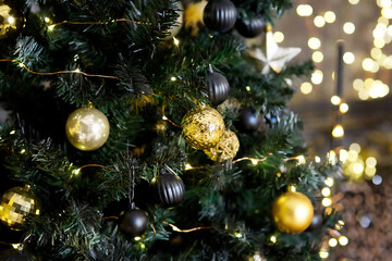 Obraz na płótnie Canvas Elegant decorated with balls and figures Christmas tree