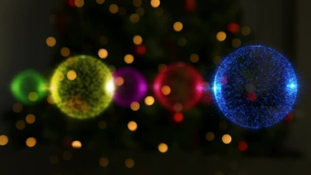 Animation of multicoloured christmas baubles decorations on black background