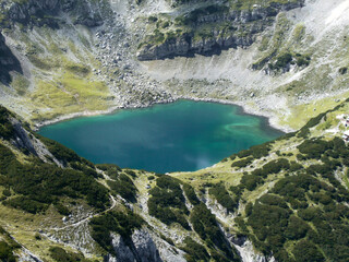 Fototapeta na wymiar Via ferrata at high mountain lake Drachensee, Tajakante, Tyrol, Austria