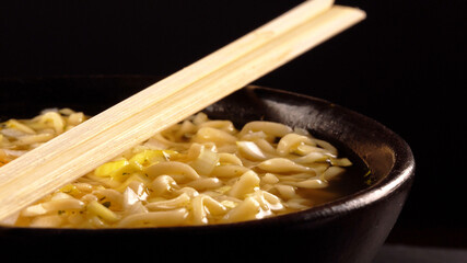Bowl with classical chinese noodle soup.