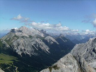 Fototapeta premium Via ferrata at high mountain lake Seebensee, Tajakopf mountain, Tyrol, Austria