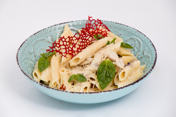 fresh pasta on a blue plate