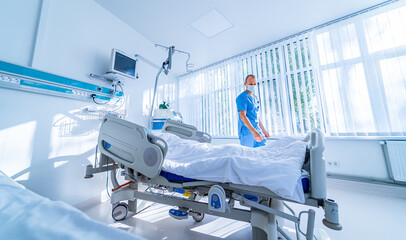 Interior hospital design concept. Interior of resuscitation chamber in modern clinic. Screen with tests. COVID-19 and coronavirus identification. Pandemic. Closeup.