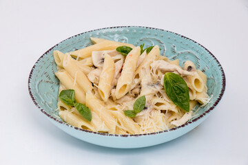 fresh pasta on a blue plate