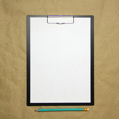A tablet with a white sheet of A4 format on a beige craft paper.