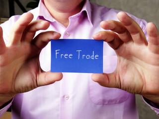 Financial concept about Free Trade  with sign on the piece of paper.
