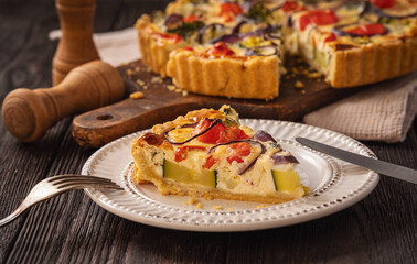 Homemade quiche with vegetables and cheese, vegetarian food.