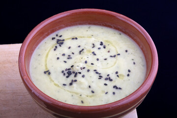 zucchini soup cream with seeds topping