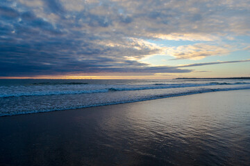 Obraz premium .sunset on the beach with clouds