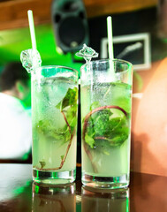 Two glasses of majitos on a table at a club in Havana Cuba