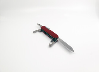 a red military knife for travel and outdoor use.