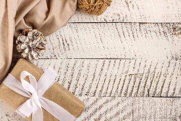 Merry christmas concepts with gift box and ornament element on white wooden table background with copy space