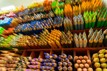 colored pencils on the counter at the store