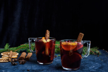 Still life, food and drink, seasonal and holidays concept. Christmas mulled wine on a rustic wooden table. Selective focus, copy space background