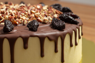 cake with chocolate, prunes and nuts
