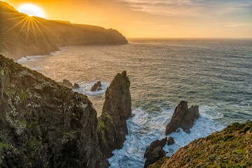 sunset on the wild rocky coast of galicia in northern Spain