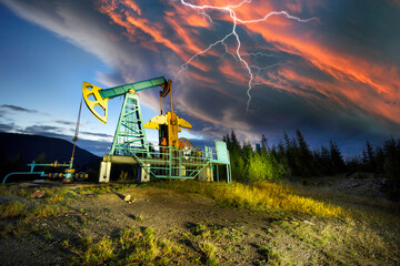 Oil platform in the night mountains
