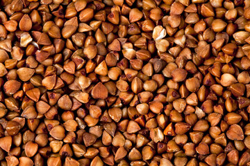 Background of buckwheat groats. Top view.