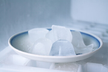 Fototapeta na wymiar ice cubes on a saucer