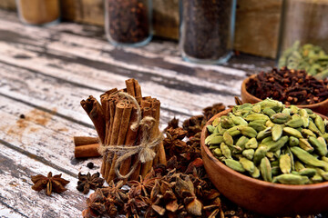 Bunch of spices on a wooden table