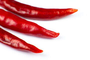 Red hot chili peppers on white background. Close up.