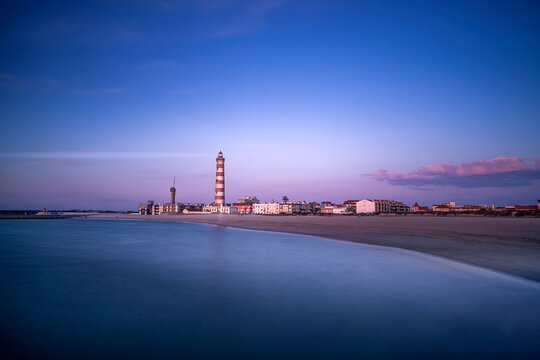 Lighthouse light into the sunset