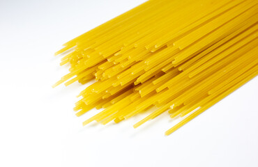 Close up uncooked pasta spaghetti macaroni on white background