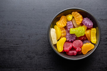 Colorful fruity jelly candies in bowl