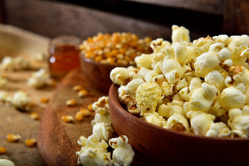 Homemade fresh popcorn in a wooden bowl