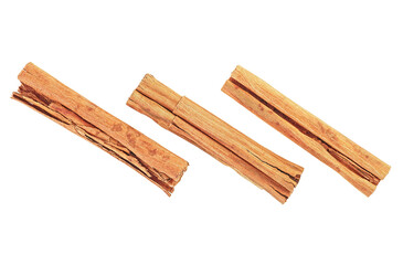 Close up of cinnamon sticks isolated on a white background, top view. Three cinnamon sticks. Ceylon cinnamon.