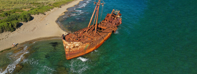 Aerial drone ultra wide photo of famous abandoned old rusty shipwreck of Dimitrios in Selinitsa bay...